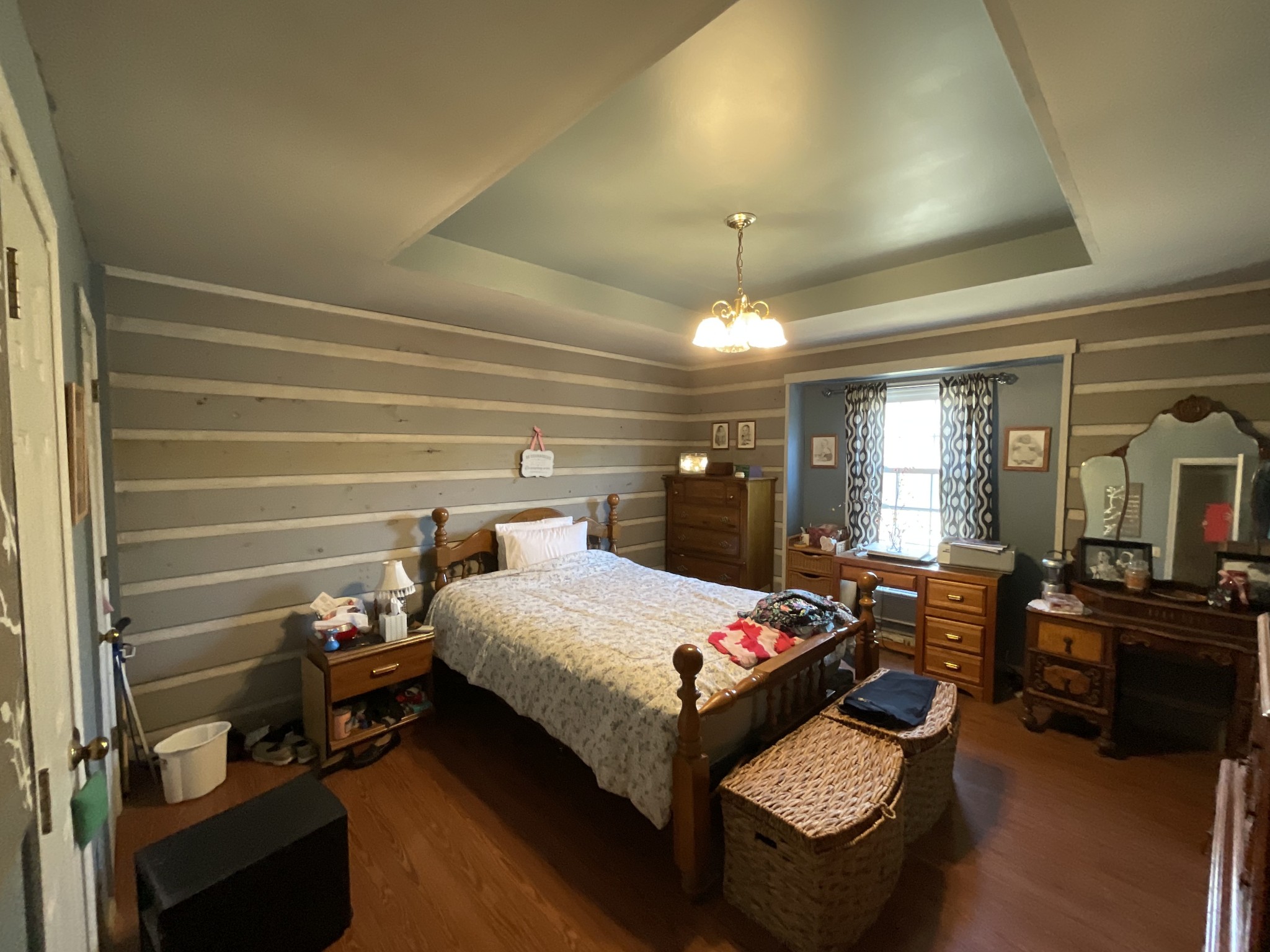 9173 Versailles Road Rockvale, TN 37153 - Photo 29 of 66 a bedroom with a bed and wooden floor