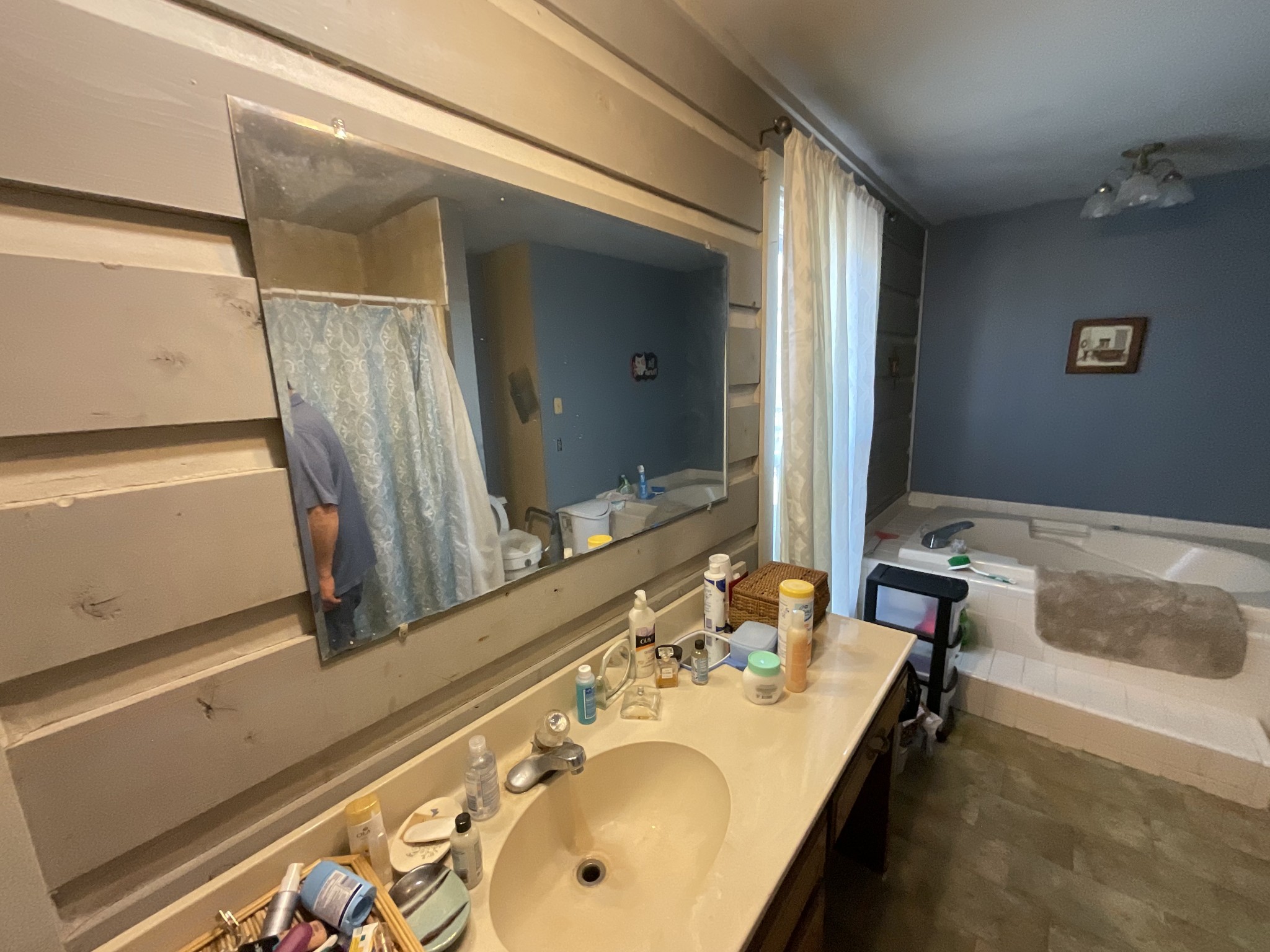 9173 Versailles Road Rockvale, TN 37153 - Photo 32 of 66 a bathroom with a tub sink and mirror