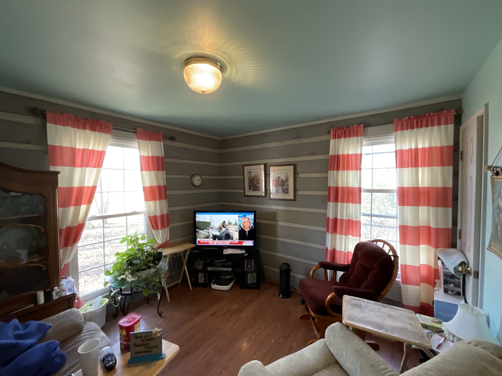 9173 Versailles Road Rockvale, TN 37153 - Photo 34 of 66 a living room with furniture a flat screen tv and a fireplace