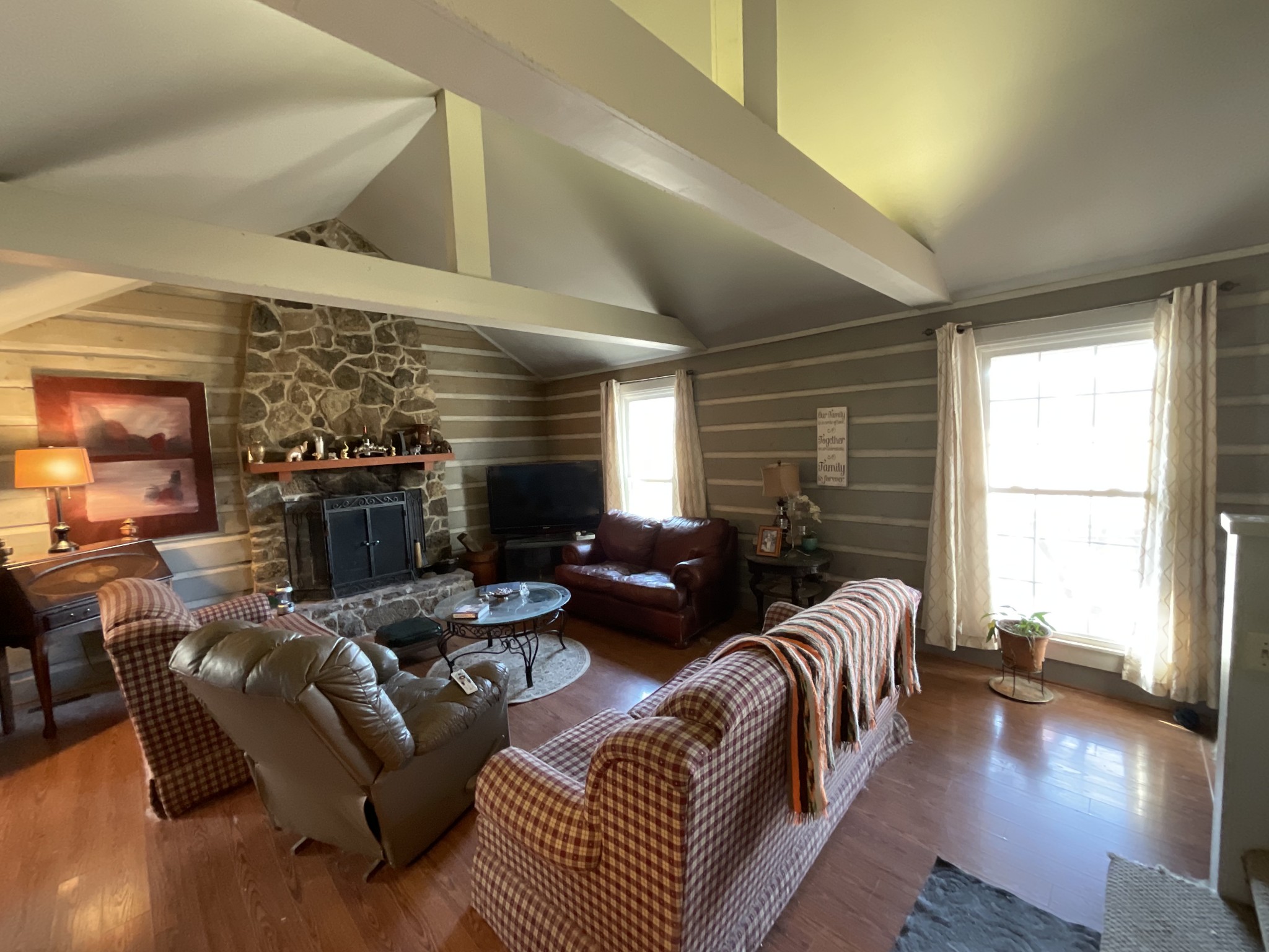 9173 Versailles Road Rockvale, TN 37153 - Photo 8 of 66 a living room with furniture fireplace and a large window
