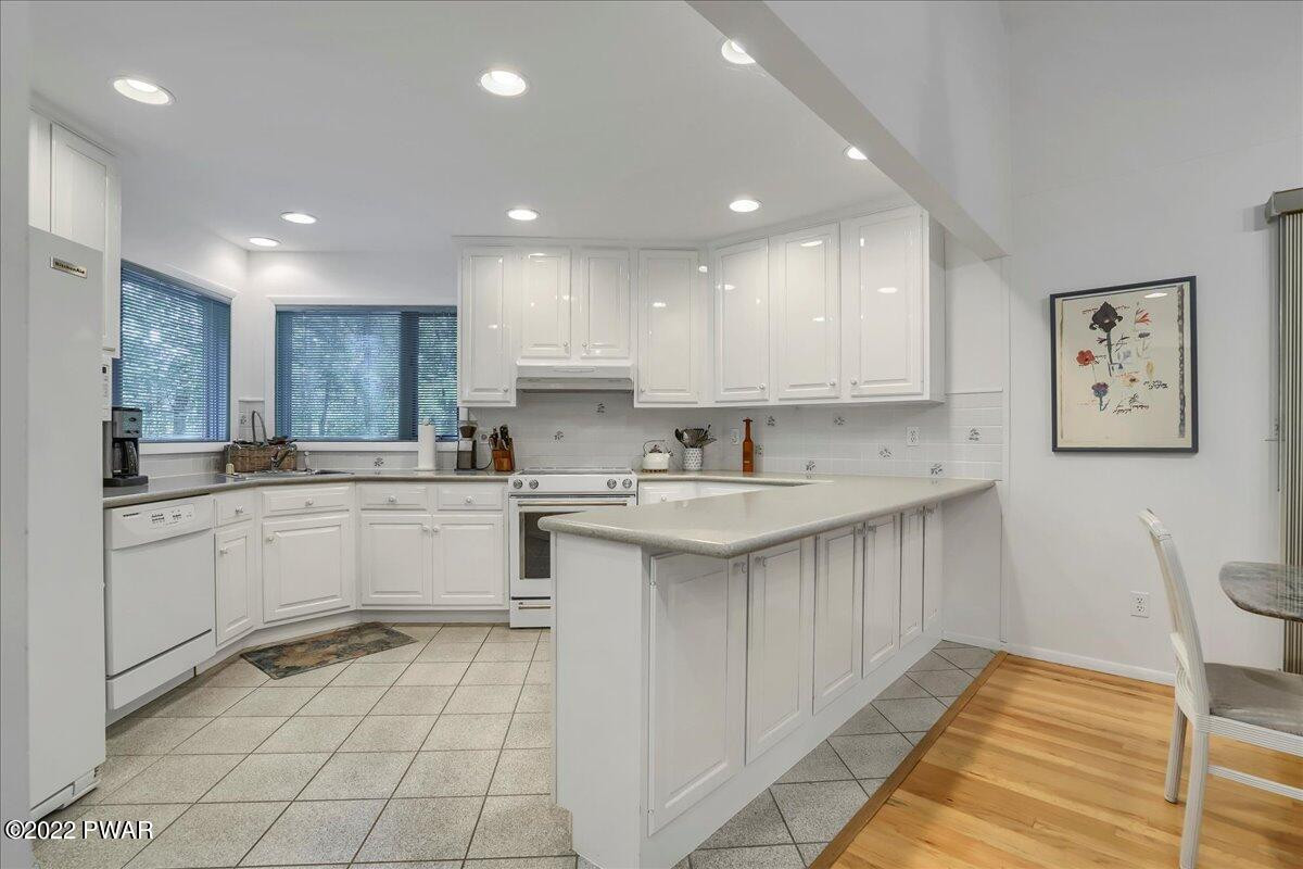 110 Ridge Road Hawley, PA 18428 - Photo 6 of 49 a kitchen with a sink and cabinets