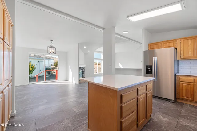 an empty room with a empty space and window