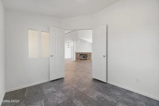 a view of livingroom with furniture and floor to ceiling window