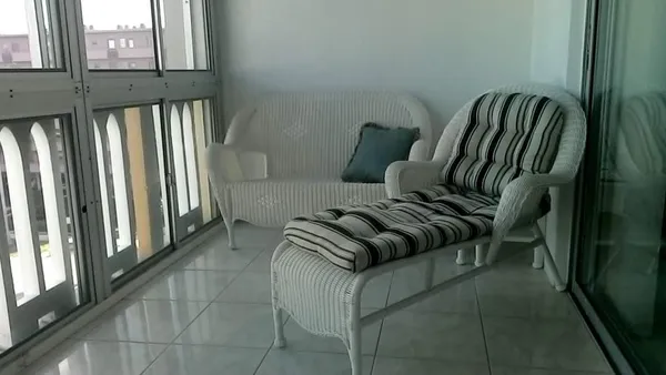a view of living room and furniture