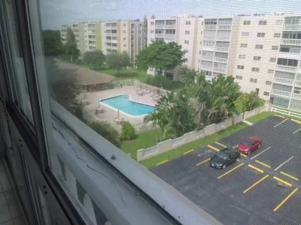 a view of a balcony with an outdoor space
