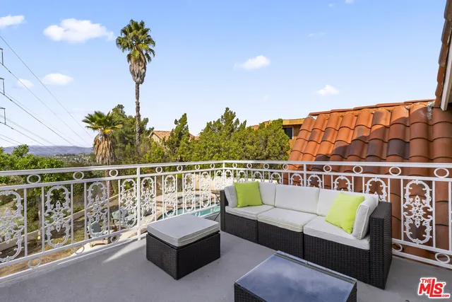 a balcony with hardwood