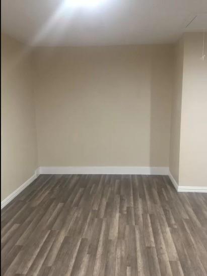 2801 Mill Pond Road Garland, TX 75044 - Photo 4 of 18 a view of an empty room and wooden floor