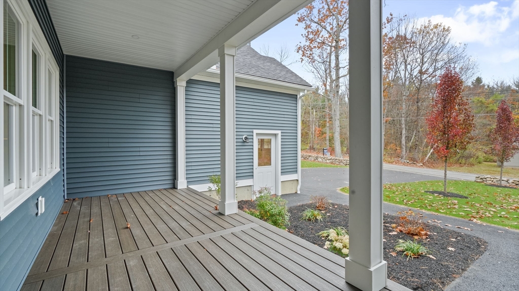 29-4 Sunset Road Westminster, MA 01473 - Photo 4 of 37 a view of a house with backyard and wooden floor