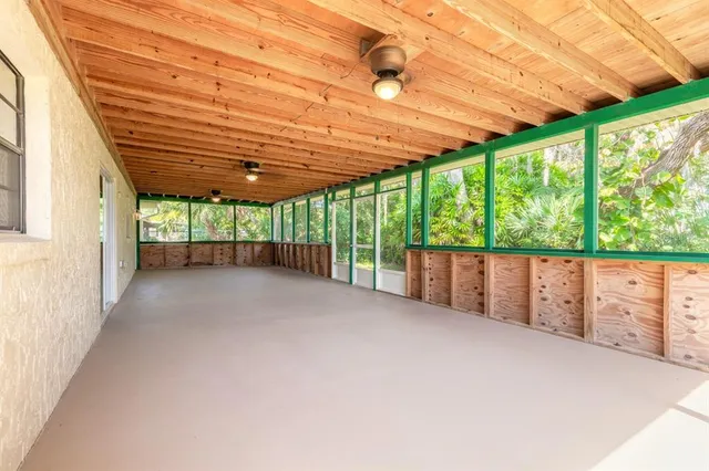 a view of backyard with green space