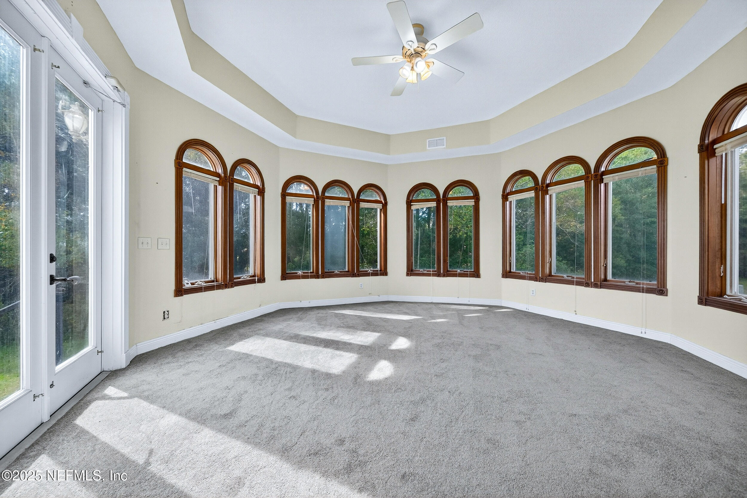 45500 Stratton Road Callahan, FL 32011 - Photo 20 of 58 a view of a hallway with windows chandelier