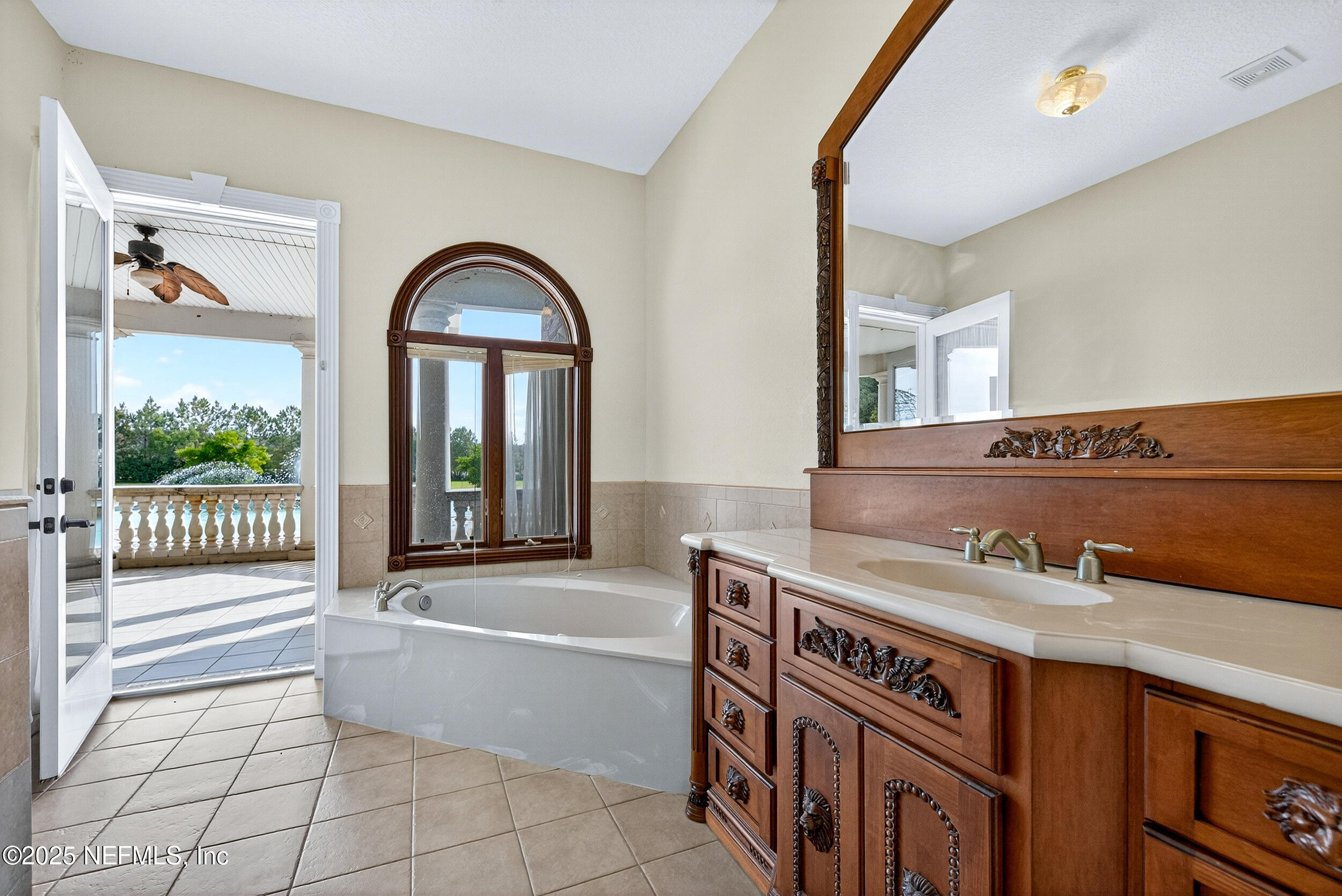 45500 Stratton Road Callahan, FL 32011 - Photo 21 of 58 a view of a kitchen with a sink and a large window