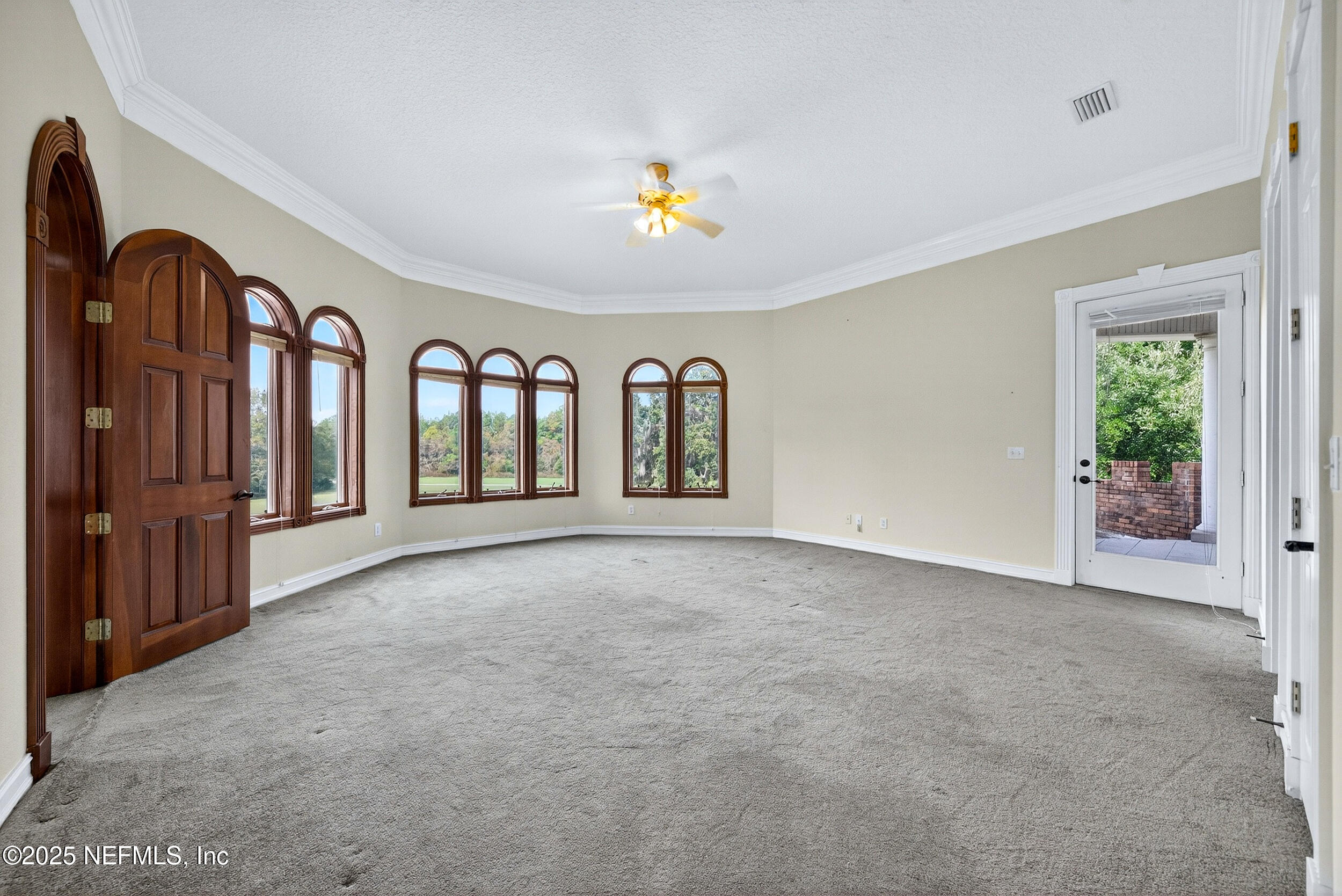 45500 Stratton Road Callahan, FL 32011 - Photo 28 of 58 a view of an entryway with chandelier