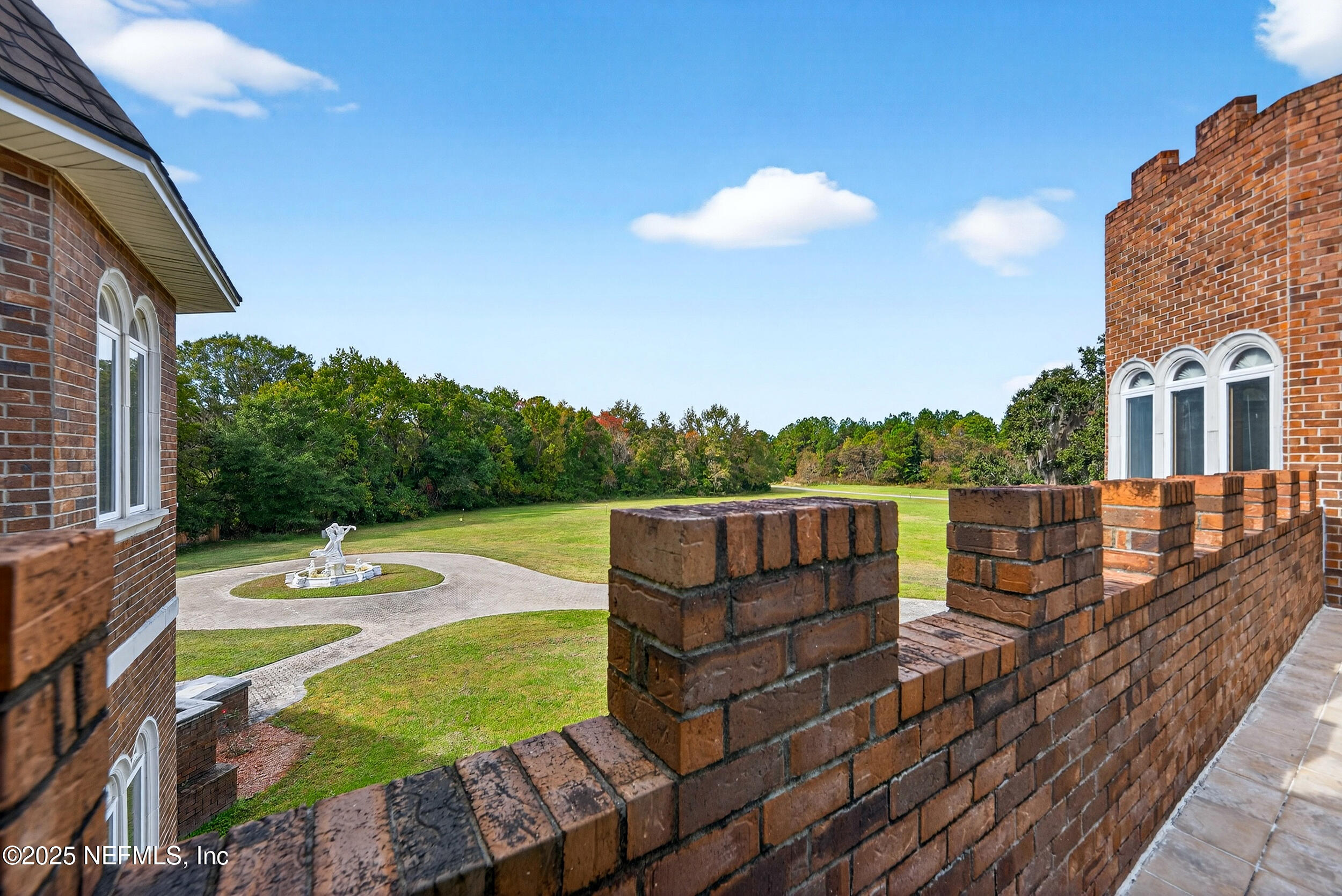 45500 Stratton Road Callahan, FL 32011 - Photo 35 of 58 a view of a swimming pool with a patio and a yard