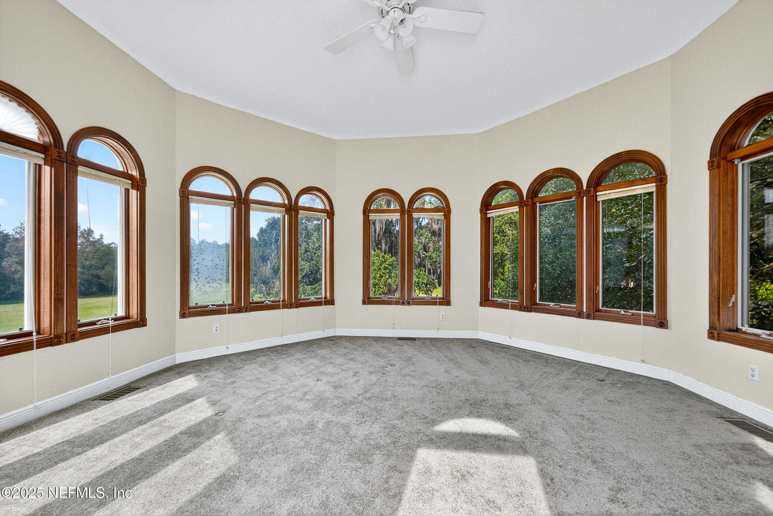 45500 Stratton Road Callahan, FL 32011 - Photo 36 of 58 a view of an entryway with a chandelier