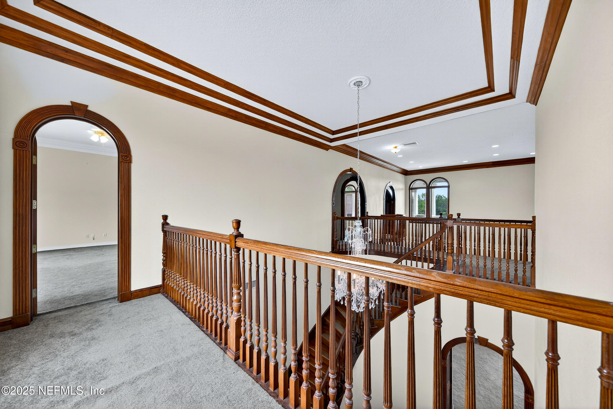 45500 Stratton Road Callahan, FL 32011 - Photo 40 of 58 a view of staircase with railing and a large window