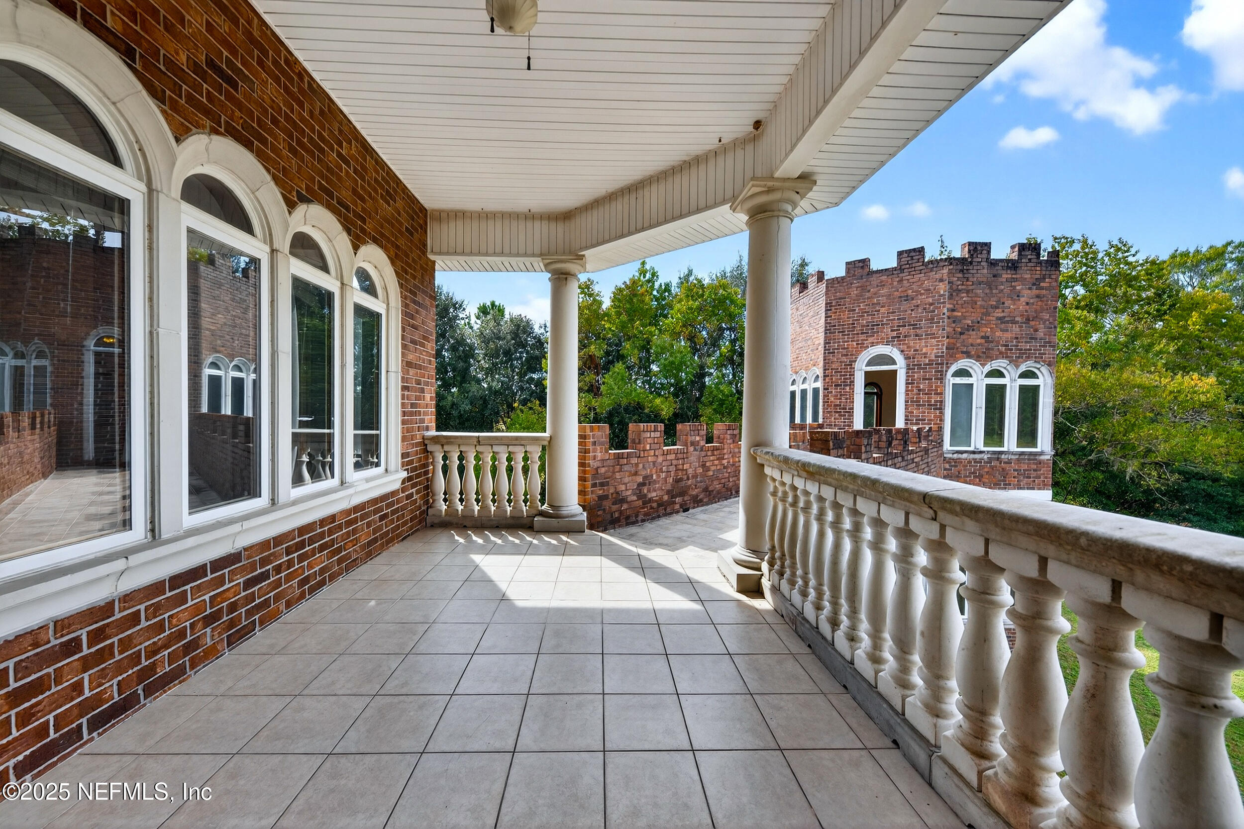 45500 Stratton Road Callahan, FL 32011 - Photo 41 of 58 a view of a house with backyard and porch