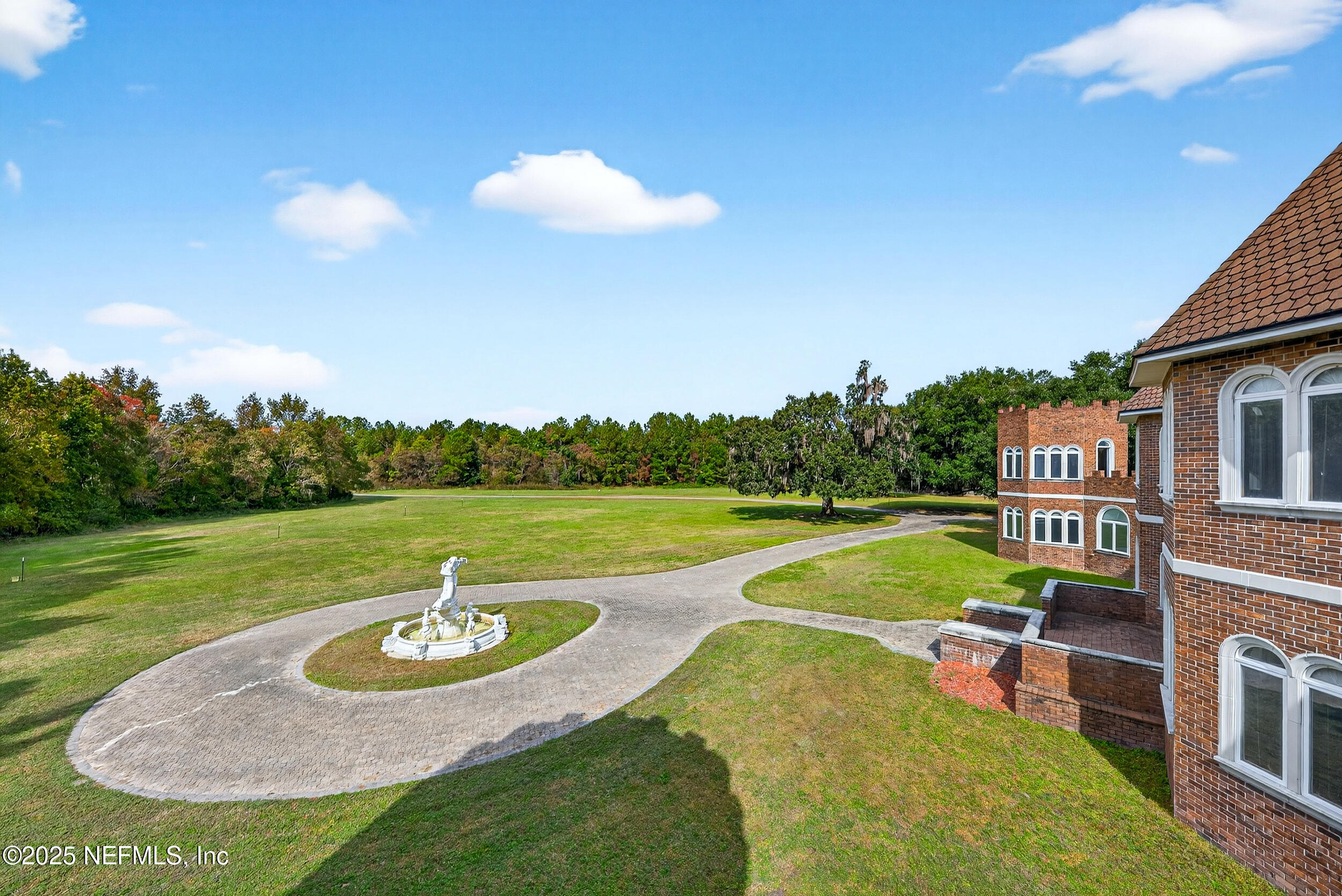 45500 Stratton Road Callahan, FL 32011 - Photo 44 of 58 a view of a swimming pool with a yard