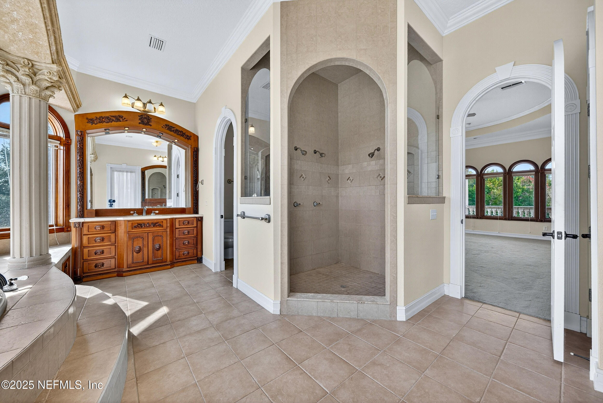 45500 Stratton Road Callahan, FL 32011 - Photo 45 of 58 a view of a bathroom with tub shower and mirror