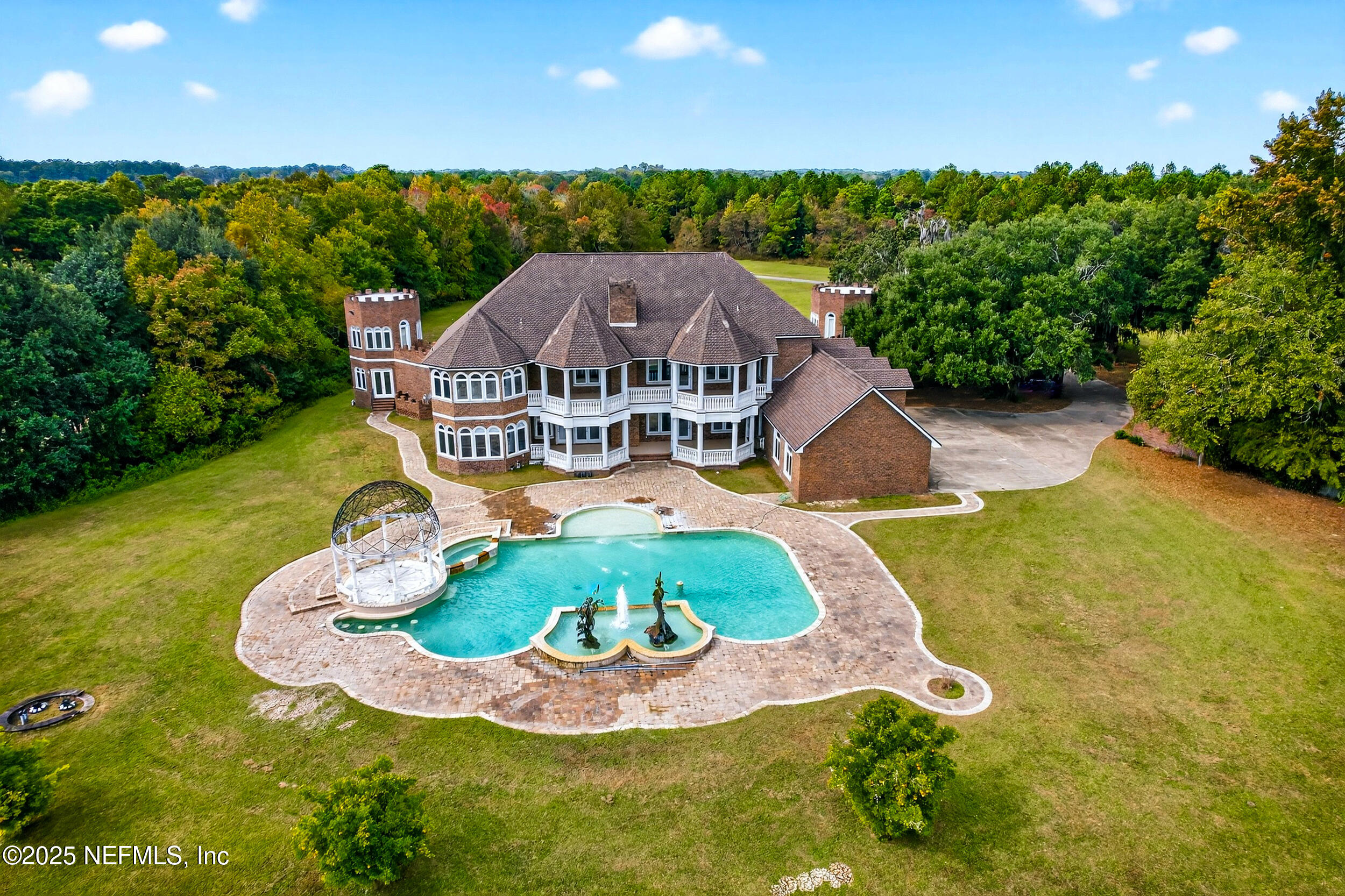 45500 Stratton Road Callahan, FL 32011 - Photo 57 of 58 a view of a house with a yard and potted plants