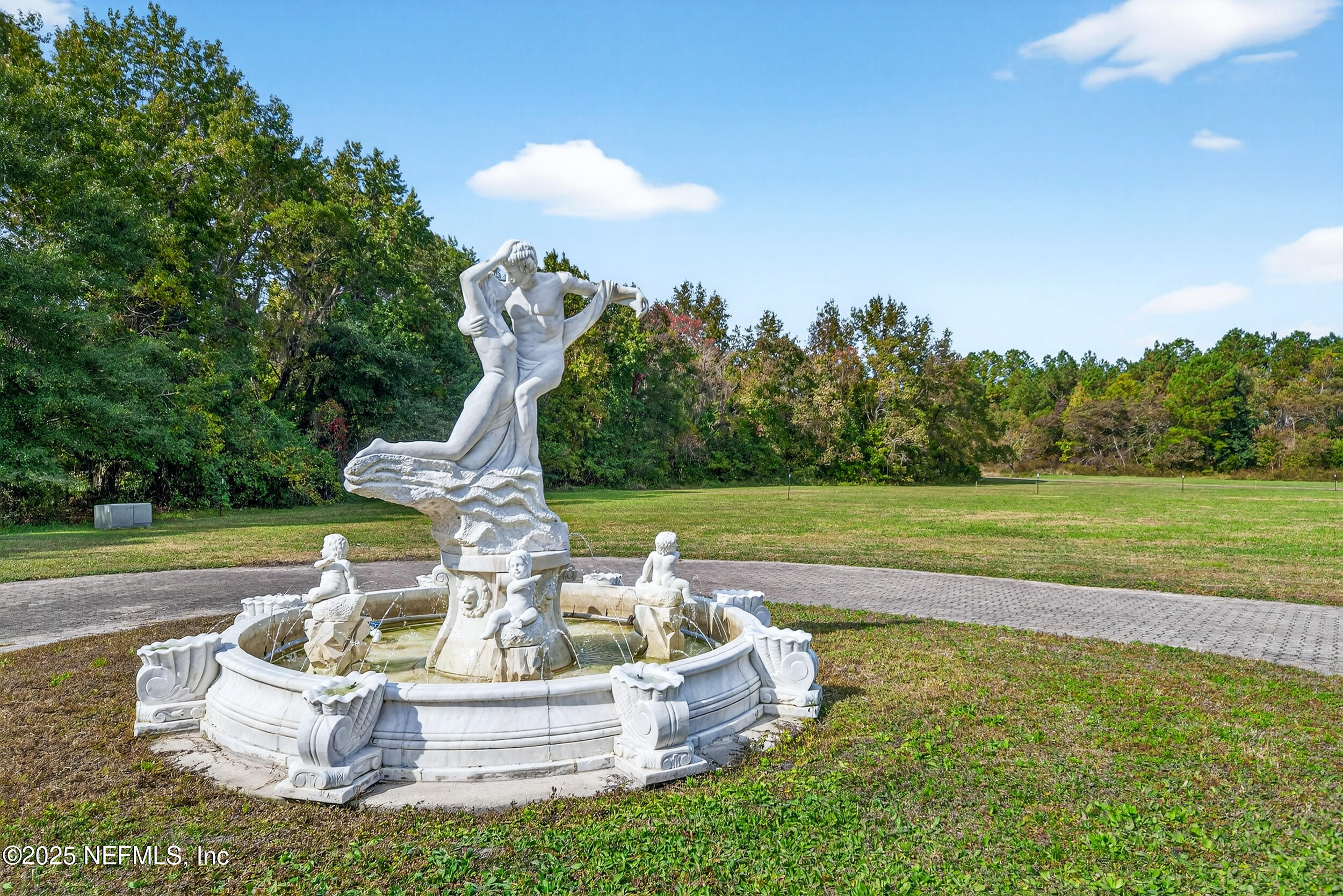 45500 Stratton Road Callahan, FL 32011 - Photo 6 of 58 a water fountain in the middle of a park