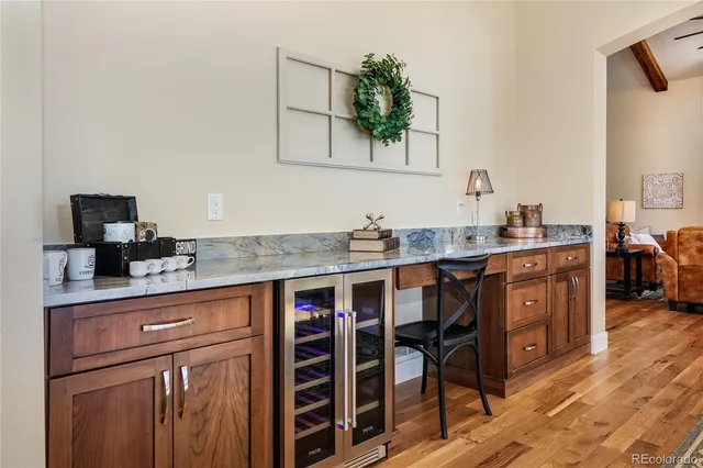 a kitchen with stainless steel appliances a sink and cabinets