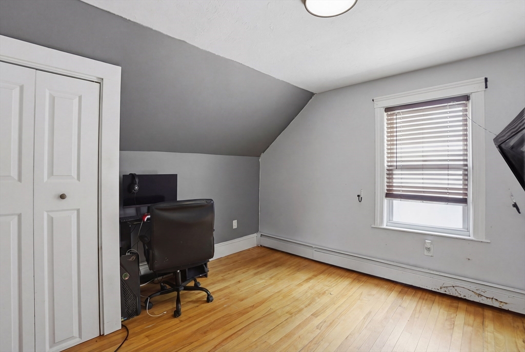 23 Dryden Street Worcester, MA 01605 - Photo 24 of 29 a view of a workspace with furniture and a window