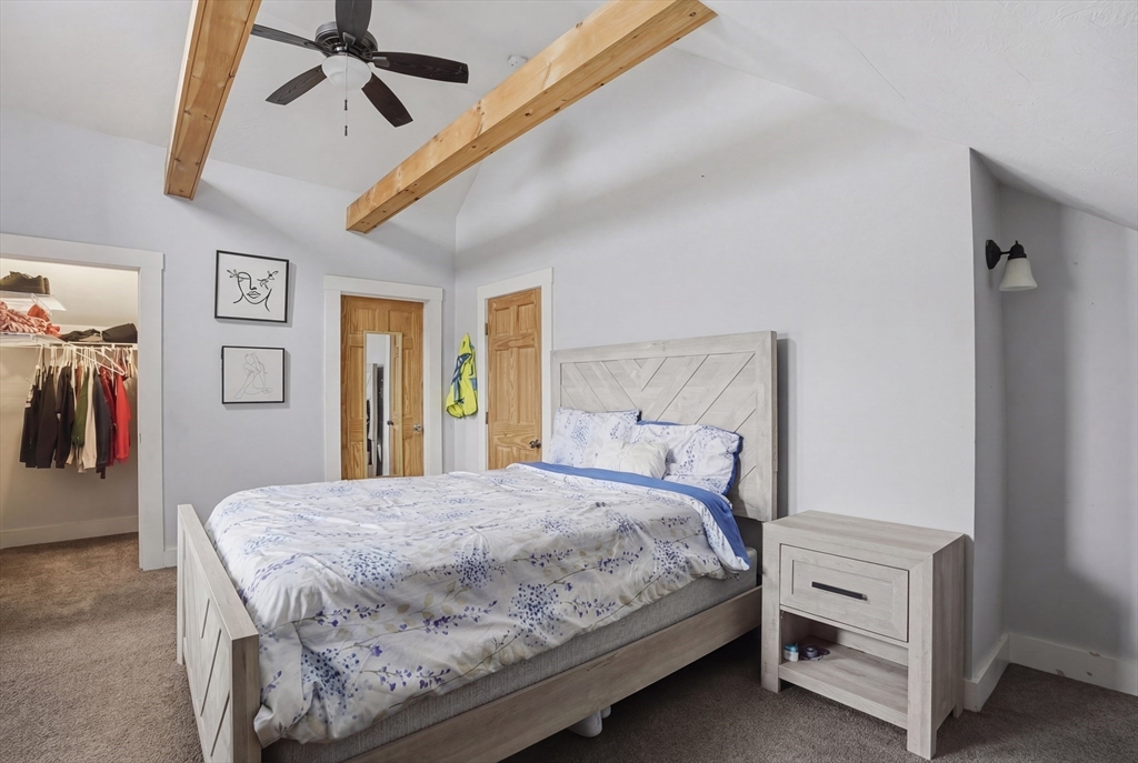 23 Dryden Street Worcester, MA 01605 - Photo 26 of 29 a bedroom with a bed and a view of bedroom