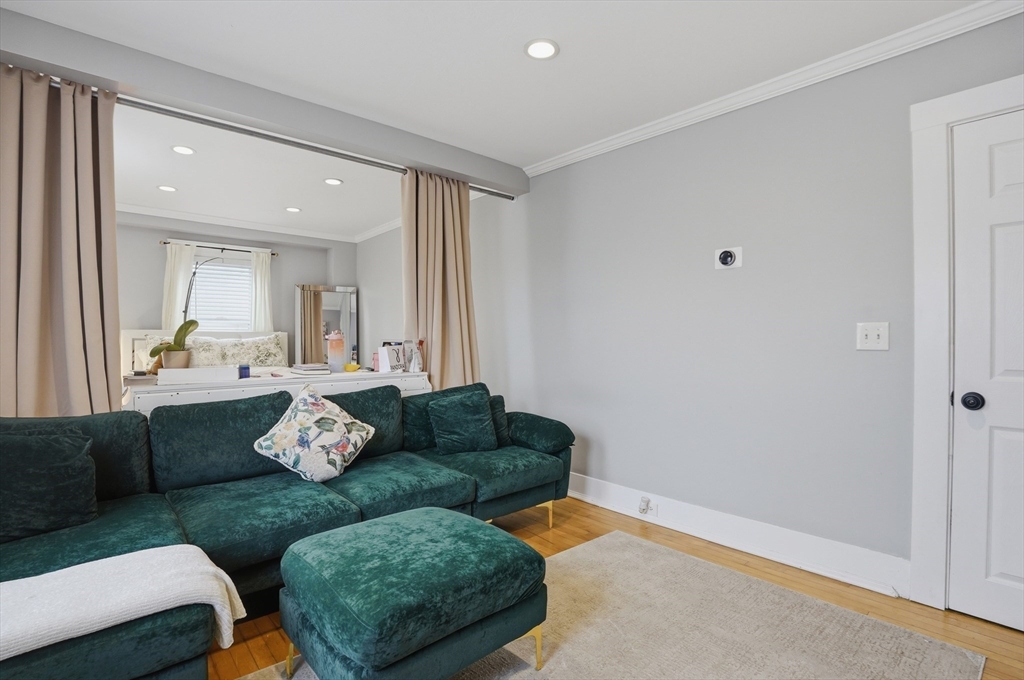 23 Dryden Street Worcester, MA 01605 - Photo 6 of 29 a living room with furniture and a window