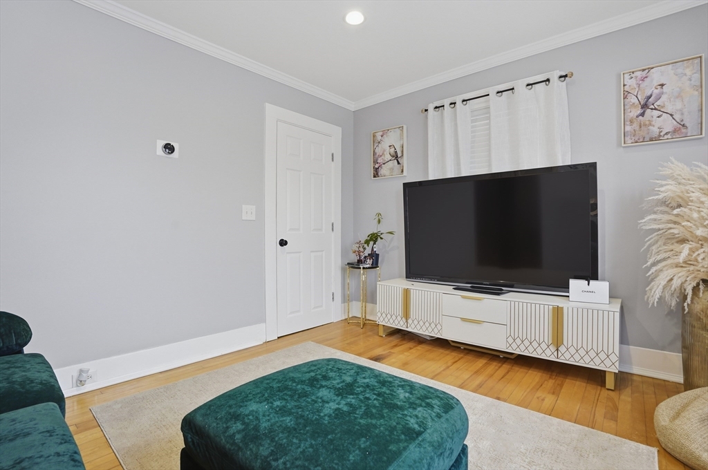 23 Dryden Street Worcester, MA 01605 - Photo 7 of 29 a living room with furniture and a flat screen tv