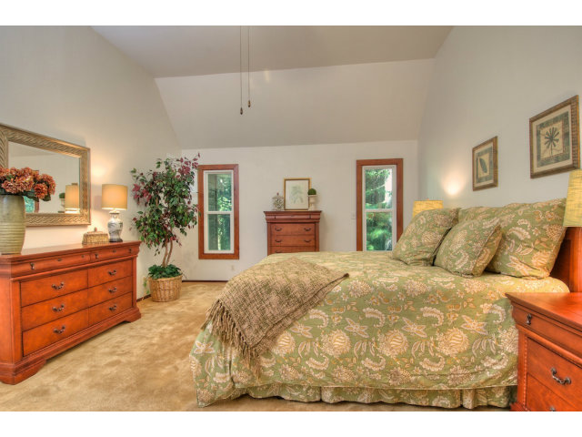 13872 Silver Sky Way Redwood City, CA 94062 - Photo 12 of 24 a bedroom with a bed and a dresser
