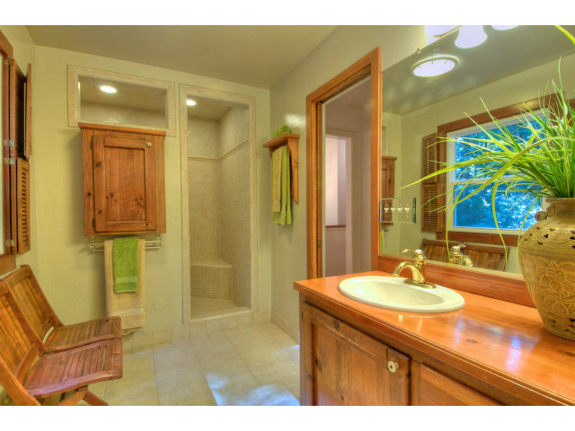 13872 Silver Sky Way Redwood City, CA 94062 - Photo 13 of 24 a bathroom with a sink and a mirror