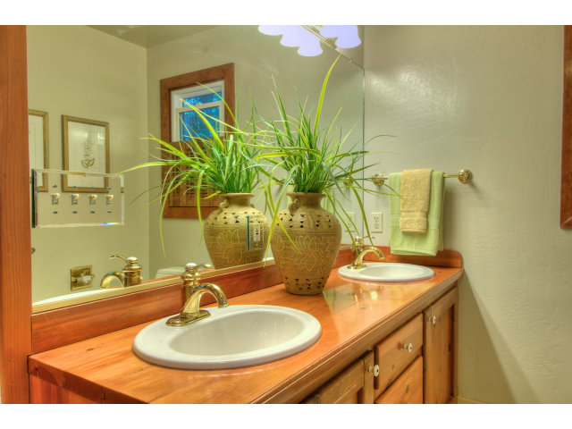 13872 Silver Sky Way Redwood City, CA 94062 - Photo 14 of 24 a bathroom with a sink and a mirror