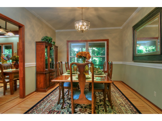 13872 Silver Sky Way Redwood City, CA 94062 - Photo 5 of 24 a view of a dining room with furniture and chandelier