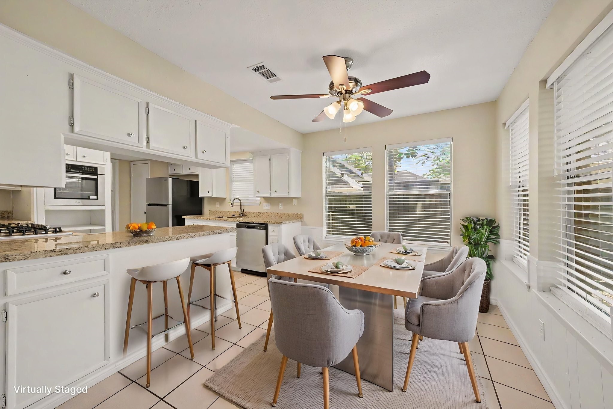 17419 Cassina Drive Spring, TX 77388 - Photo 18 of 35 a dining room with furniture a window and kitchen view
