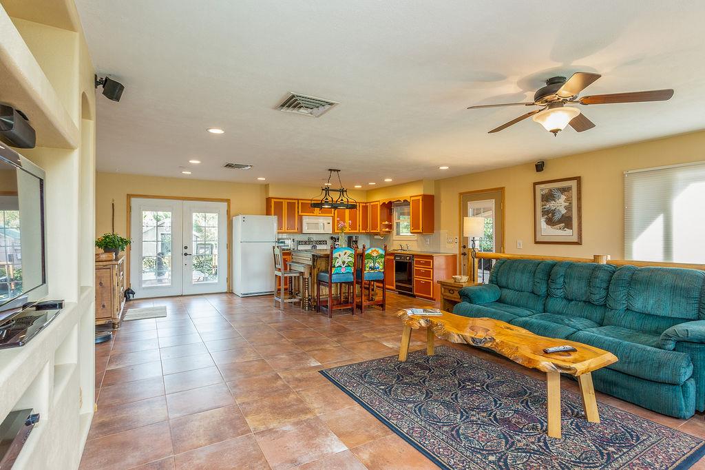 3596 G Road Palisade, CO 81526 - Photo 3 of 42 a living room with furniture and a wooden floor