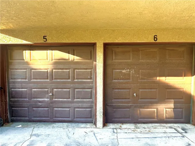 a view of a door and wooden floor