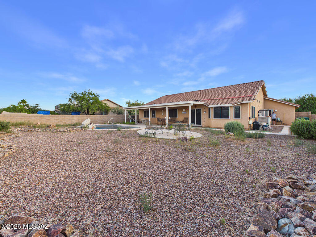 6827 South Star Ridge Place Tucson, AZ 85757 - Photo 21 of 28 a view of house with outdoor space