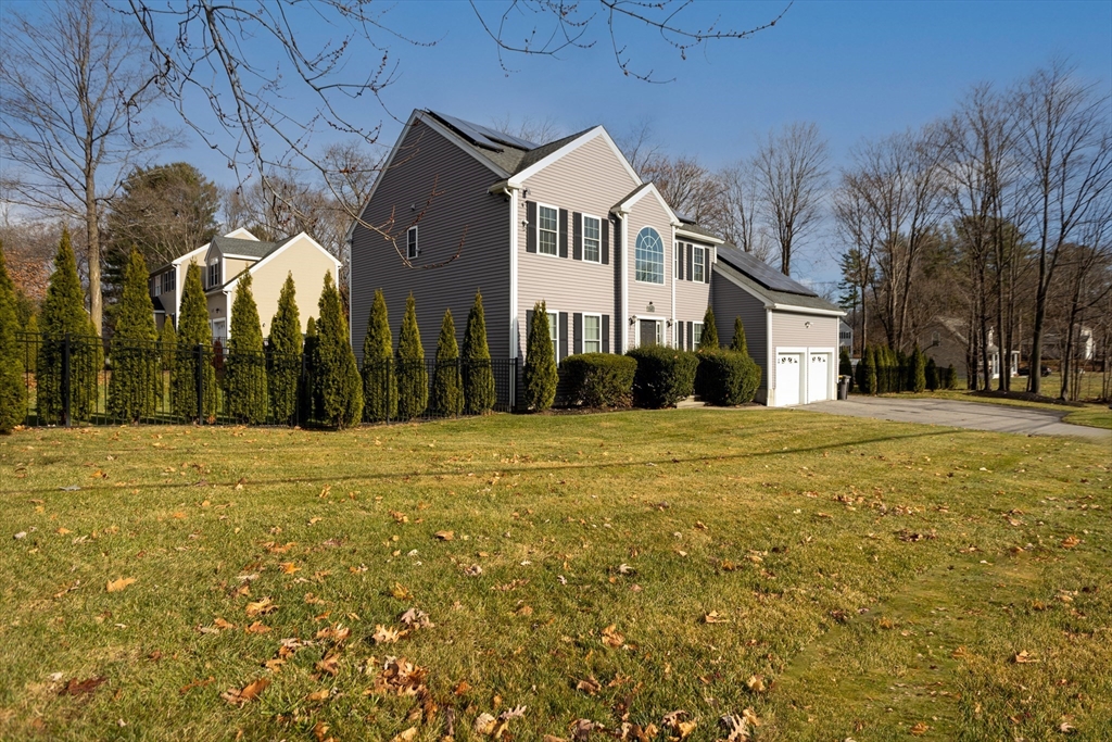 143 Potter Road Framingham, MA 01701 - Photo 2 of 42 a front view of house with yard