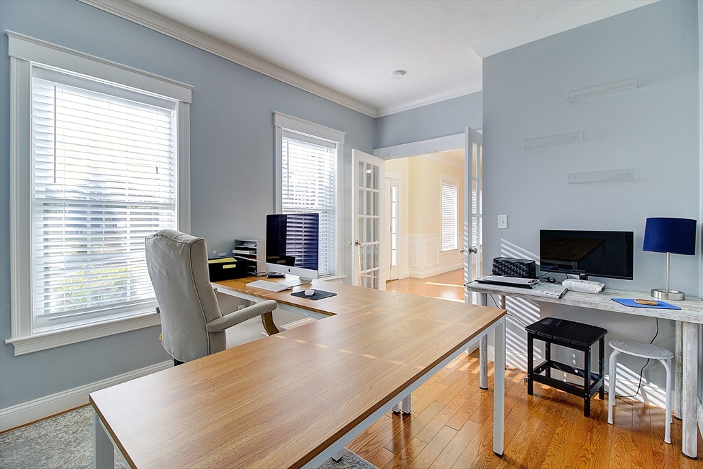 143 Potter Road Framingham, MA 01701 - Photo 22 of 42 a view of a workspace with furniture and a window