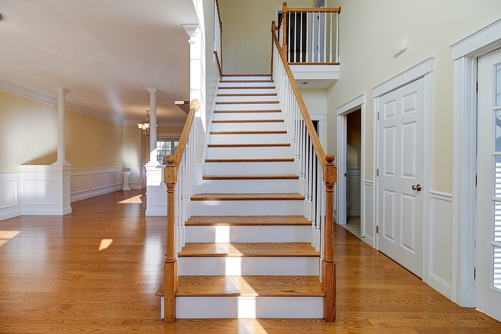 143 Potter Road Framingham, MA 01701 - Photo 23 of 42 a view of entryway and hall with wooden floor