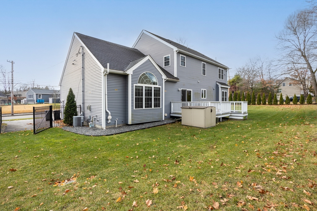 143 Potter Road Framingham, MA 01701 - Photo 38 of 42 a front view of house with yard