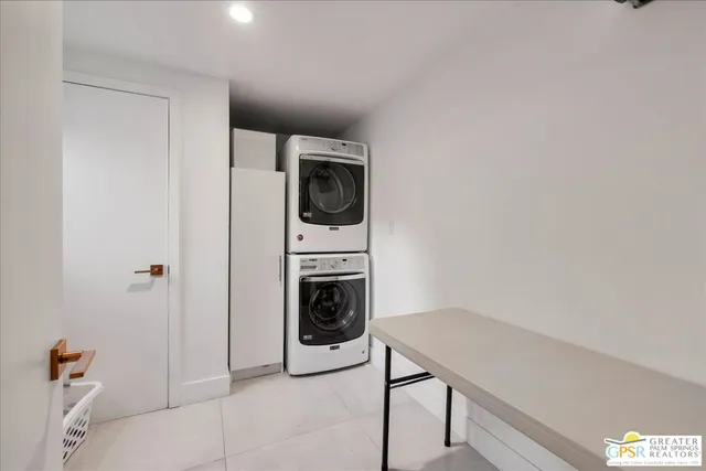 a view of swimming pool with a lounge chair