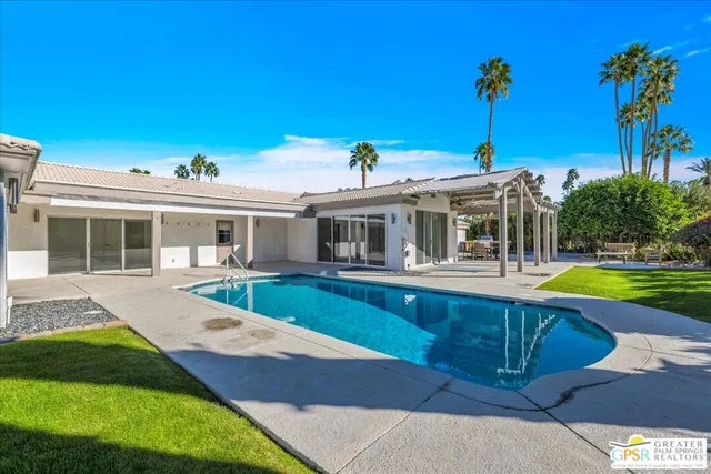 an aerial view of residential building and ocean