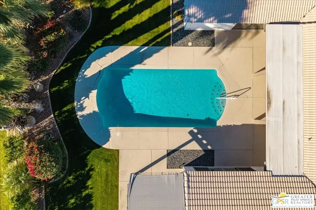 a view of a city with mountains in the background