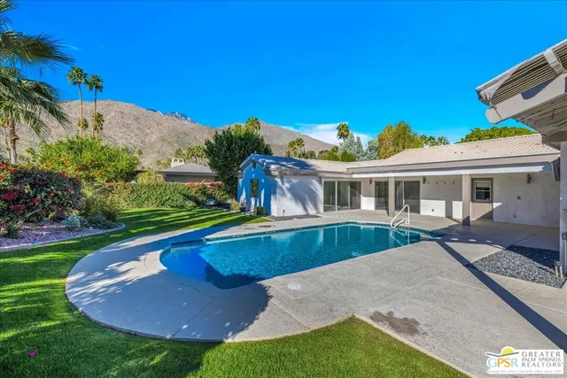 a view of a house with a swimming pool