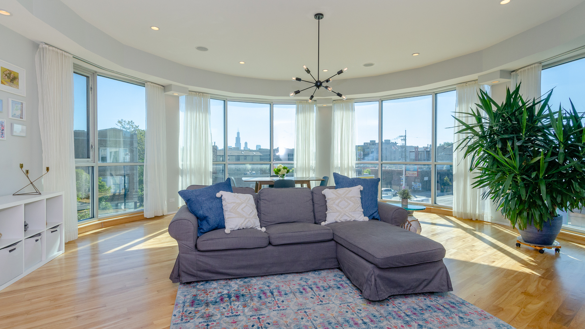 2408 West Rice Street, Unit 301 Chicago, IL 60622 - Photo 2 of 20 a living room with furniture and a large window