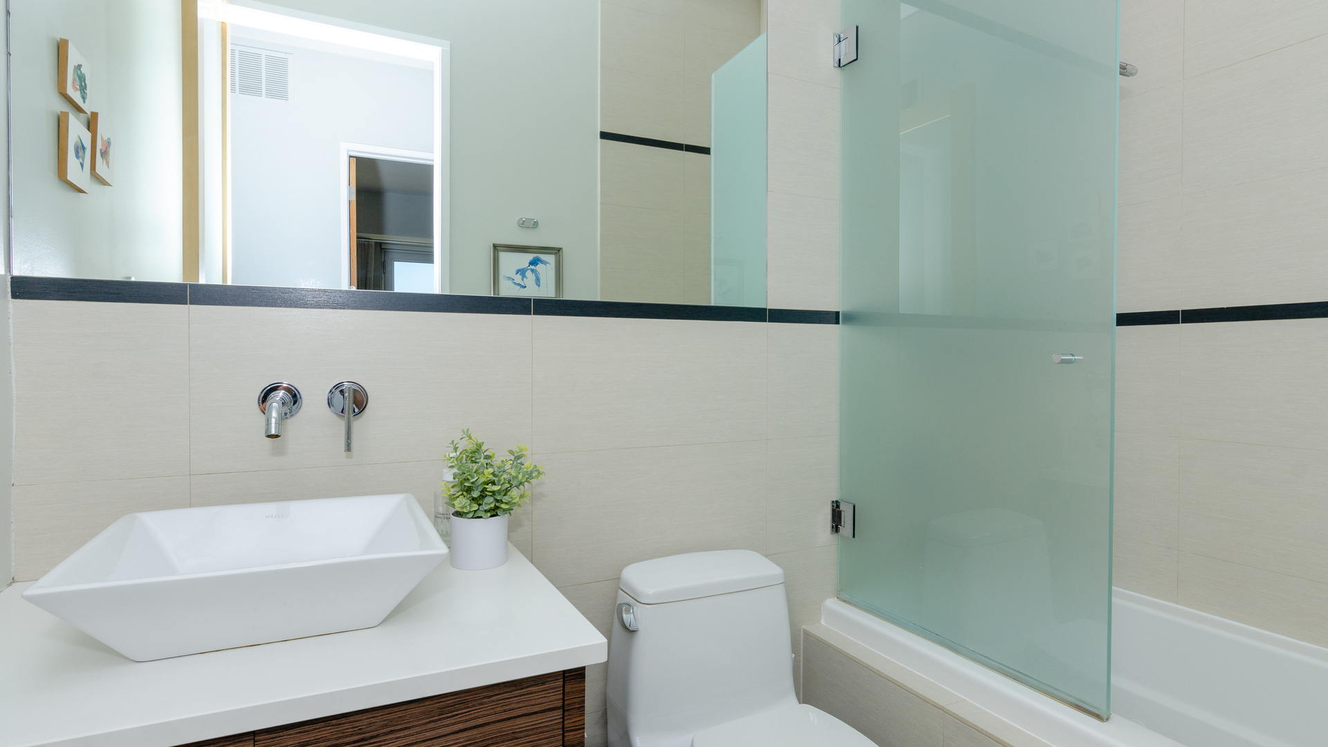 2408 West Rice Street, Unit 301 Chicago, IL 60622 - Photo 14 of 20 a bathroom with a sink a toilet and shower
