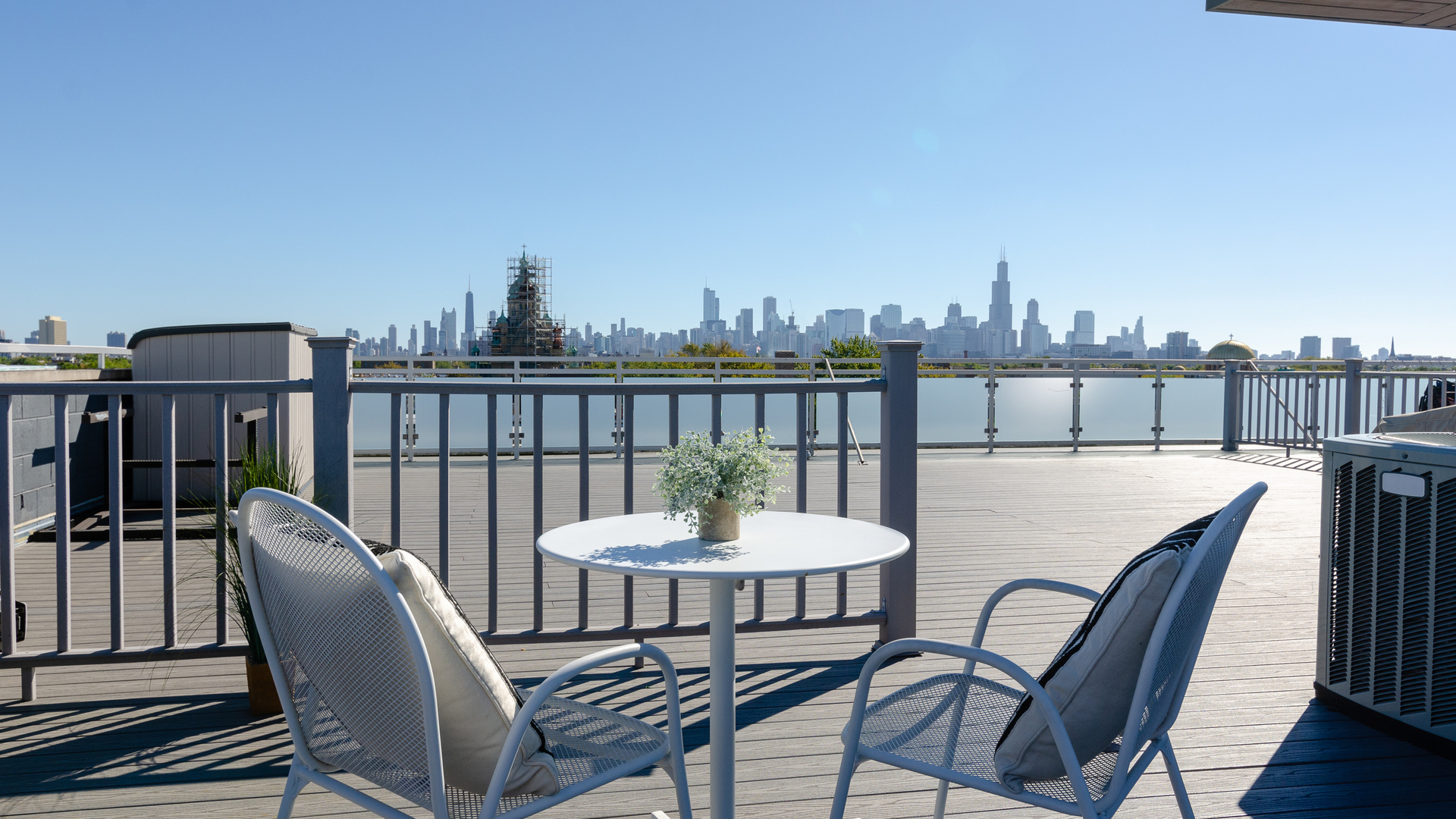 2408 West Rice Street, Unit 301 Chicago, IL 60622 - Photo 15 of 20 a view of a balcony with a table and chairs