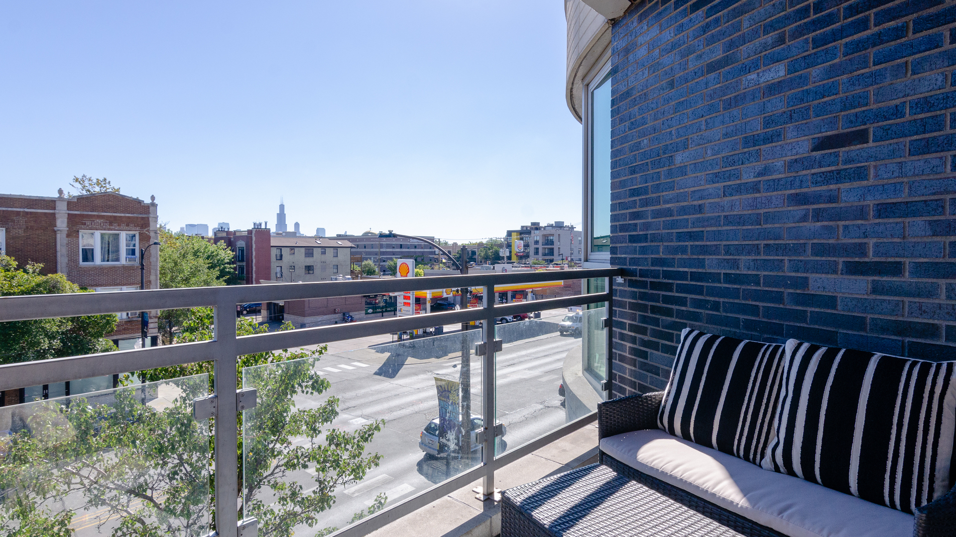 2408 West Rice Street, Unit 301 Chicago, IL 60622 - Photo 17 of 20 a view of city from a balcony