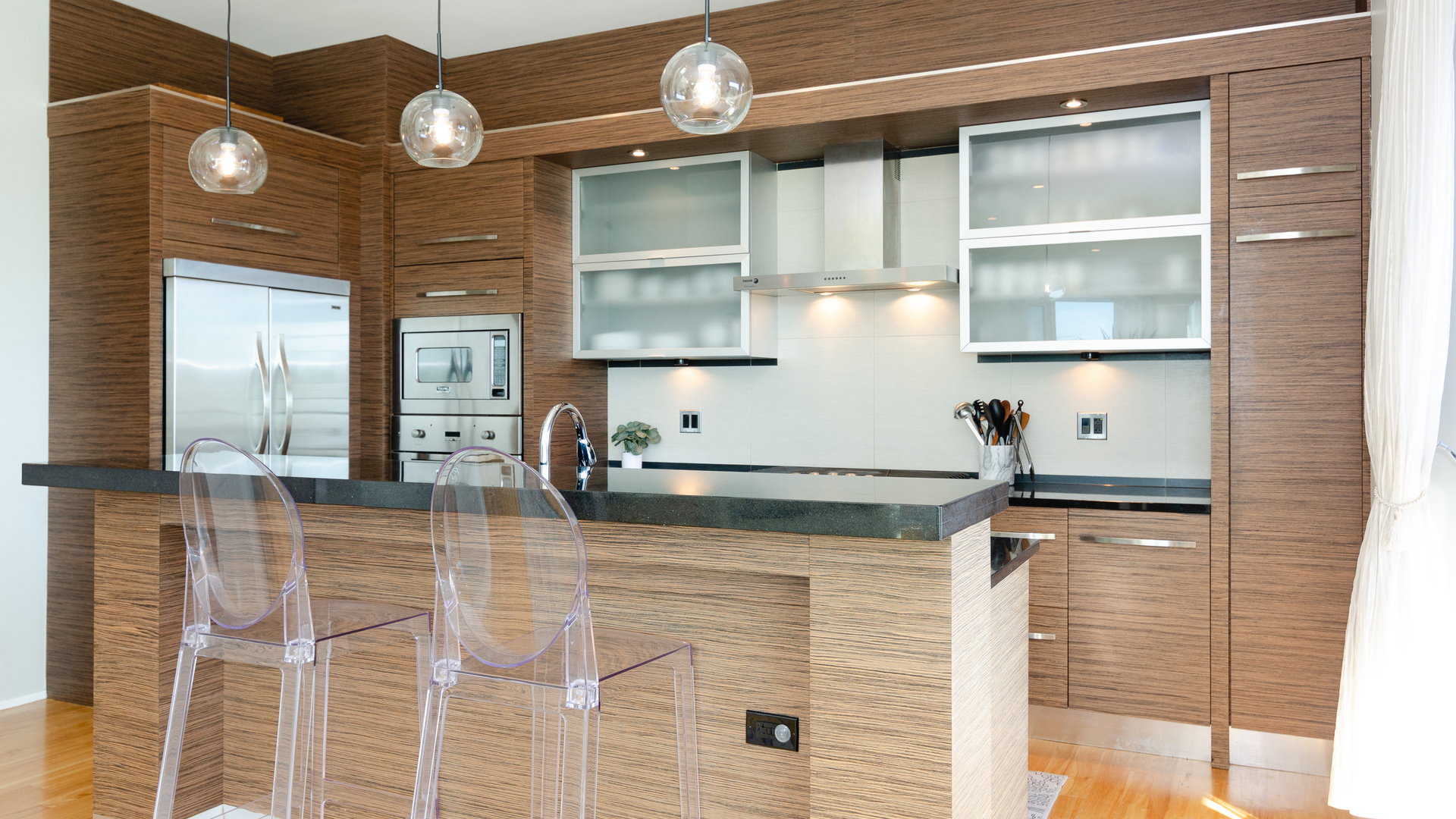2408 West Rice Street, Unit 301 Chicago, IL 60622 - Photo 7 of 20 a kitchen with a cabinets and chandelier